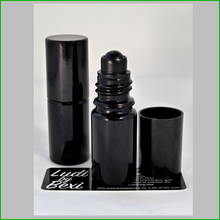 Load image into Gallery viewer, Ludi by Bexi - Spot Treatment Ingredients: castor oil, organic lime juice, Dead Sea salt, extra virgin macadamia nut oil, organic aloe vera juice, organic Peruvian ginger, Sierra spring wildflower honey, a proprietary blend of essential oils, and nothing else. 0.17 fl oz / 5 ml
